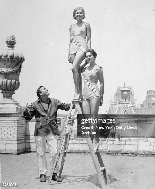 Tony Bennett with Miss Universe contestants Marie Louise Ekstrom, Miss Sweden and Carmela Kunzel, Miss Germany atop the Savoy Hotel.