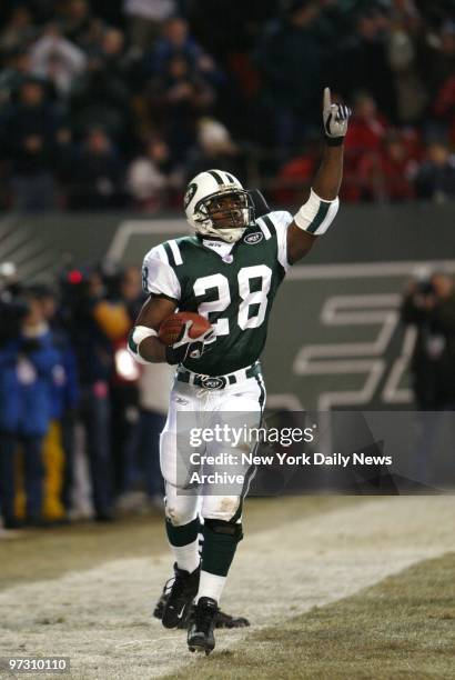 New York Jets' Curtis Martin carries the ball into the end zone in the second quarter against the Denver Broncos at Giants Stadium. Martin became the...