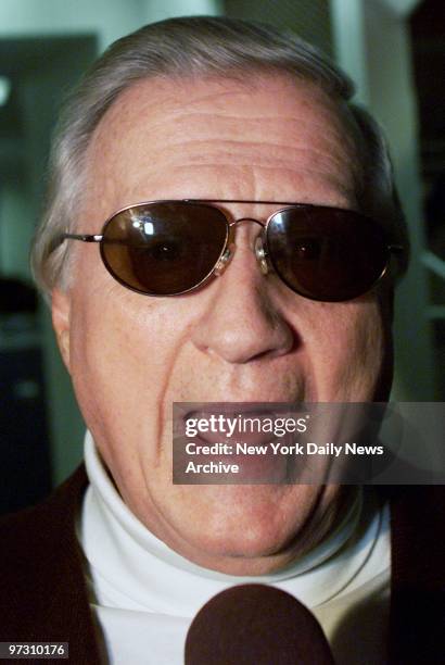 New York Yankees' principal owner George Steinbrenner sports shades as he speaks to media in the locker room after his team's 5-3 win over the...