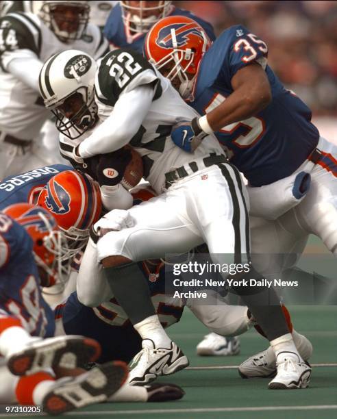 New York Jets' Dave Meggett gets tackled on punt return in second quarter during game against Buffalo Bills at Rich Stadium in Buffalo.