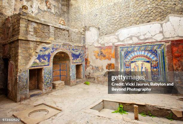 artwork found in one of the rooms at herculaneum, italy - herculaneum stock pictures, royalty-free photos & images
