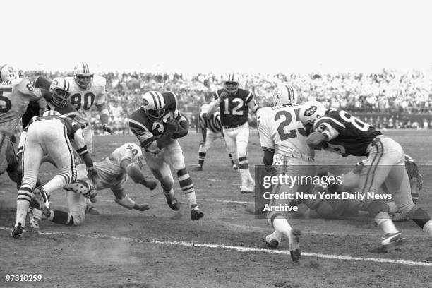 New York Jets' Emerson Boozer finds a gaping hole in the Boston line and drives through for the touchdown after taking handoff from Joe Namath in the...