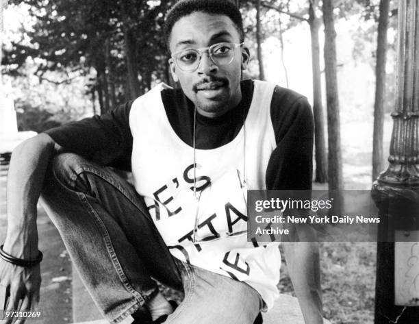 Spike Lee wearing a T-shirt from his movie "She's Gotta Have It."