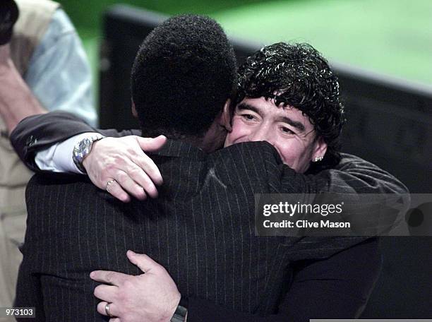 Diego Maradonna of Argentina tries to make up with Pele of Brazil afetr their recent disagreement at the FIFA World Player Gala at the Auditorium del...