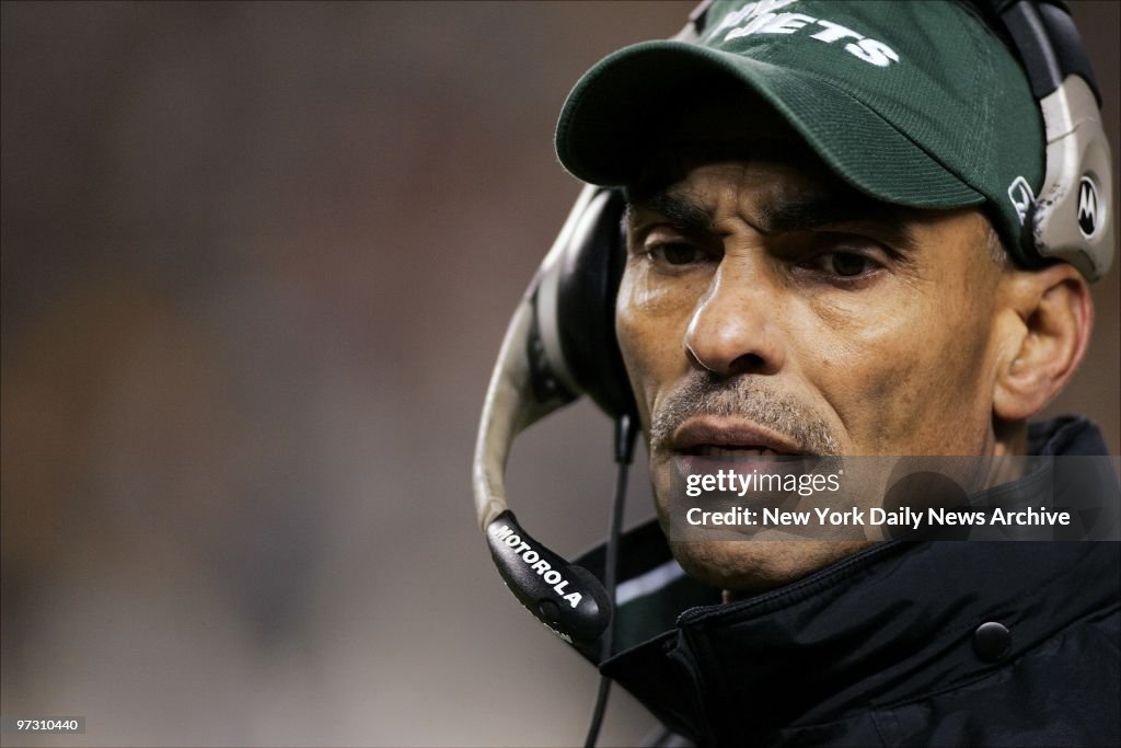 New York Jets' head coach Herm Edwards watches action from t