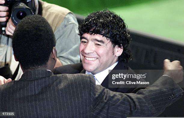 Diego Maradonna of Argentina tries to make up with Pele of Brazil afetr their recent disagreement at the FIFA World Player Gala at the Auditorium del...