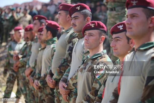 Peshmergas march to stage a protest after Iraqi Parliament decided to disannul IKRG's security forces' votes in front of Sulaymaniyah Governorate in...