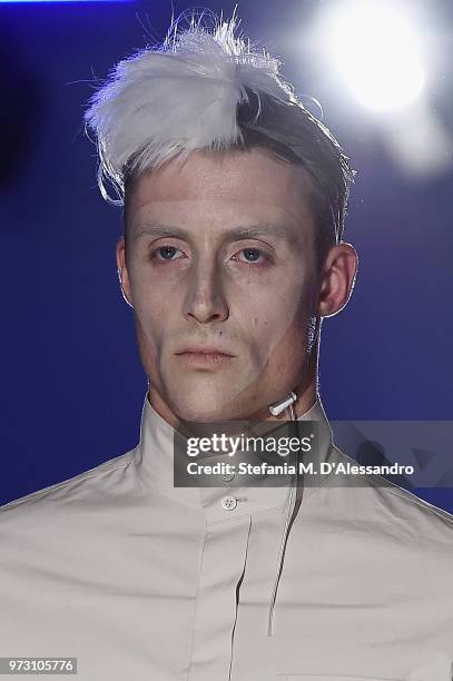 Model walks the runway at the Fumito Ganryu fashion show during the 94th Pitti Immagine Uomo on June 13, 2018 in Florence, Italy.