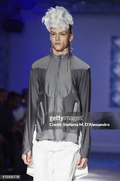 Model walks the runway at the Fumito Ganryu fashion show during the 94th Pitti Immagine Uomo on June 13, 2018 in Florence, Italy.