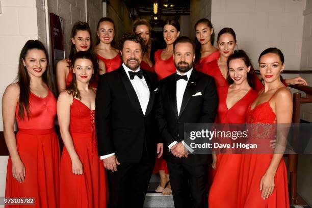 Michael Ball and Alfie Boe pose backstage with dancers during the Classic BRIT Awards rehearsals at Royal Albert Hall on June 13, 2018 in London,...