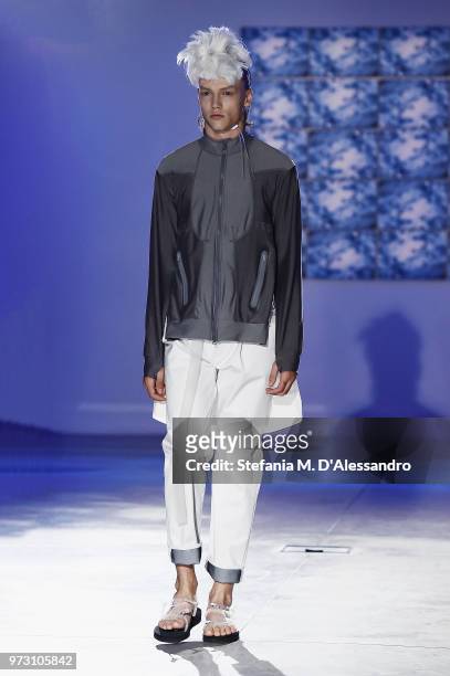 Model walks the runway at the Fumito Ganryu fashion show during the 94th Pitti Immagine Uomo on June 13, 2018 in Florence, Italy.