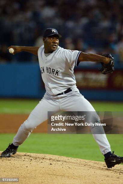 New York Yankees' reliever Jose Contreras hurls a pitch against the Florida Marlins during Game 5 of the World Series at Pro Player Stadium....