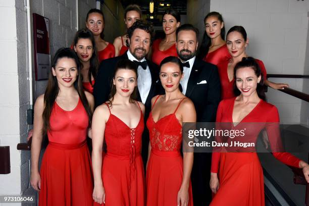 Michael Ball and Alfie Boe pose backstage with dancers during the Classic BRIT Awards rehearsals at Royal Albert Hall on June 13, 2018 in London,...