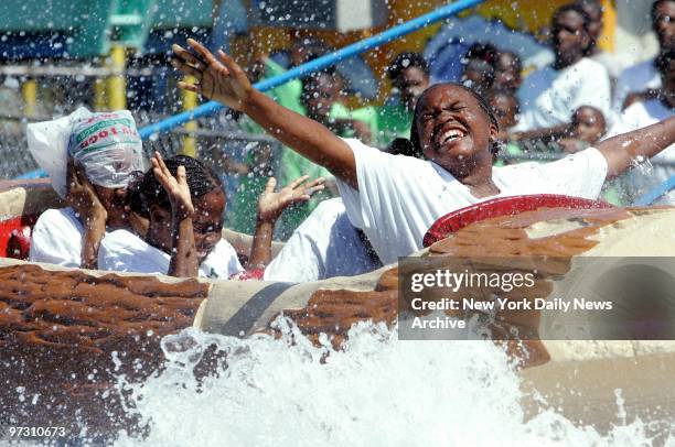 Datsha Mitchell, Brianna Mayard, Katrina Berry and Tatianna Marshall, all of Bedford-Stuyvesant, Brooklyn, enjoy a ride on the wild side on the Log...