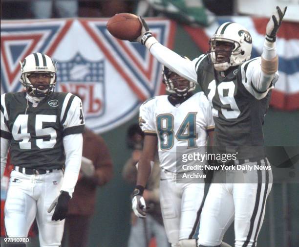New York Jets' Keyshawn Johnson celebrates after interception late in the 4th quarter against Tom Coughlin-coached Jacksonvillie Jaguars. Catch iced,...
