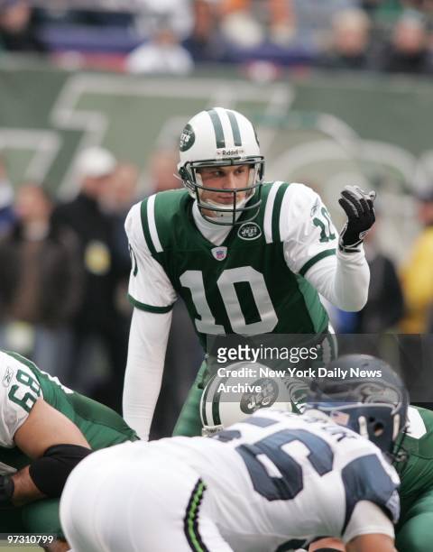 New York Jets' quarterback Chad Pennington gives signals before the snap in the first half of a game against the Seattle Seahawks at Giants Stadium....