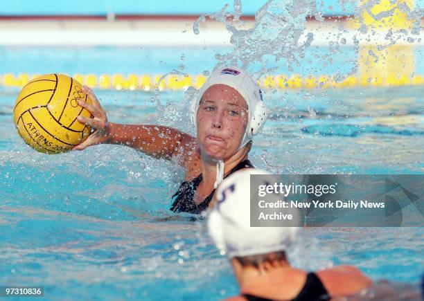 Kelly Rulon of the U.S. Looks for a receiver during a semifinal women's water polo match against Italy at the 2004 Summer Olympic Games in Athens....