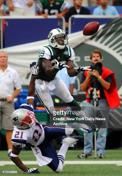 New York Jets wide receiver Jerricho Cotchery catches a pass that was called pass interference in what was a controversial call when the New York...