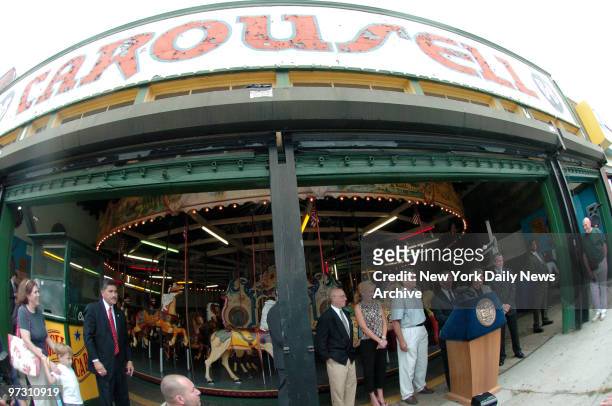 Mayor Michael Bloomberg is joined by owner Carol McCullough , Councilman Domenic Recchia and Brooklyn Borough President Marty Markowitz as he...