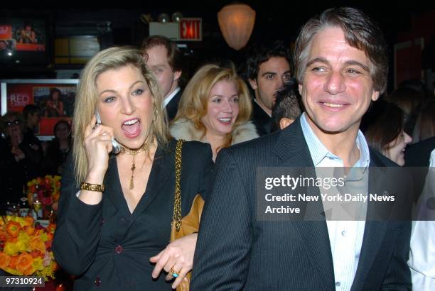 Tony Danza is amused as Tatum O'Neal gives her friend directions by phone to Entertainment Weekly's 11th annual Oscar Viewing Party at Elaine's.