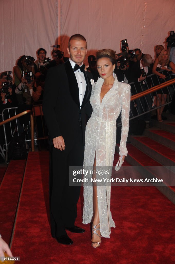 David and Victoria Beckham at the Costume Institute Gala cel