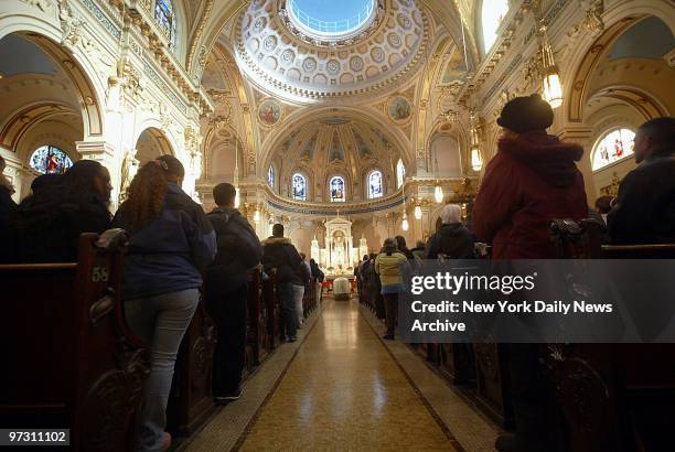 St. Barbara's Catholic Church in Bushwick, Brooklyn, is filled with mourners at funeral for 13-year-old Randy Carlote who keeled over and died...