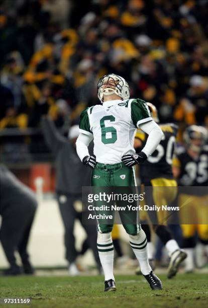 New York Jets' kicker Doug Brien yells with frustration after kicking the first of two missed field goals in the closing minutes of an AFC divisional...