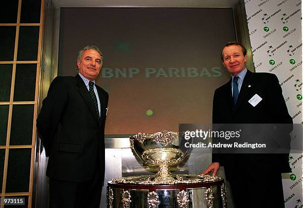 Chairman of the ITF, Francesco Ricci Bitti and Monsieur Pebereau, Chairman of BNP Paribas pose with the Davis Cup during The Official Contract...