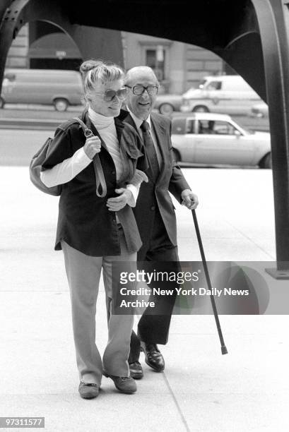 Katharine Hepburn with Joseph Levine headed for lunch.