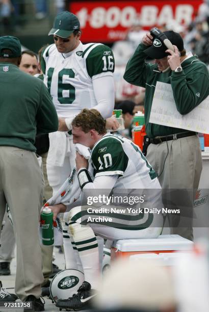 New York Jets' quarterback Chad Pennington sits on the bench after a missed field goal attempt in the second quarter of the AFC divisional playoff...