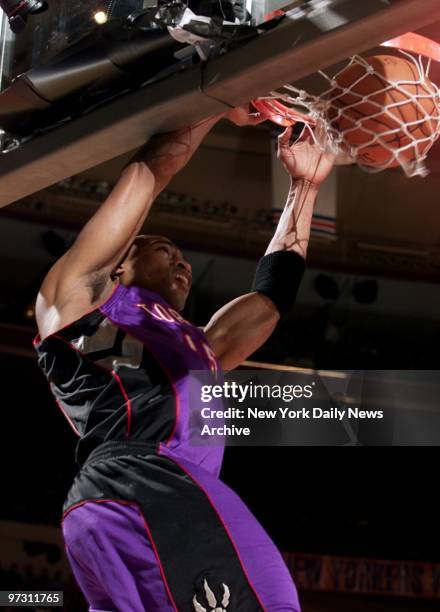 Toronto Raptors' Vince Carted slams one home during Game 2 of the their best-of-five playoff series against the New York Knicks. The Raptors routed...