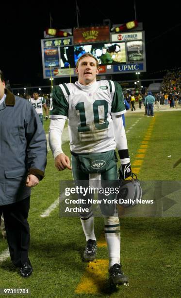 New York Jets' quarterback Chad Pennington strides off Heinz Field in Pittsburgh after the Pittsburgh Steelers defeated the Jets, 20-17, in overtime...