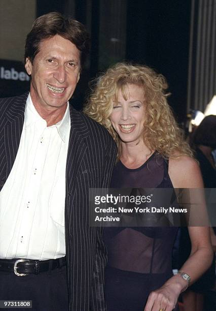 David Brenner and girlfriend Elizabeth Slater arrive for premiere of the movie "Cop Land" at the Ziegfeld Theater.