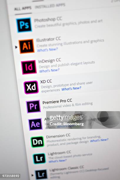 Adobe Systems Inc. Creative Cloud application icons are displayed on a computer monitor in an arranged photograph taken in Tiskilwa, Illinois, U.S.,...
