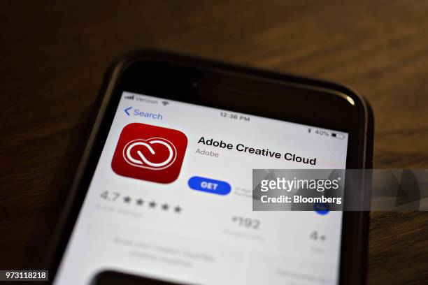 The Adobe Systems Inc. Creative Cloud application is displayed in the App Store on an Apple Inc. IPhone in an arranged photograph taken in Tiskilwa,...