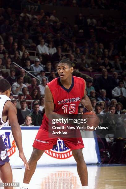 St. John's Ron Artest has the ball in the first half of a game against the University of Connecticut. UConn beat the Red Storm, 82-63, in the Big...