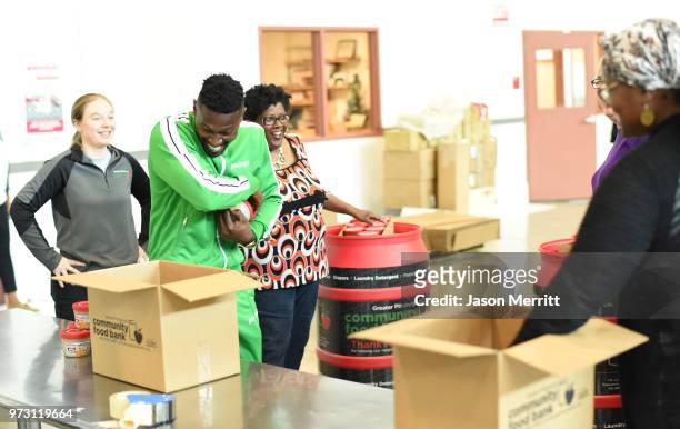 Player Antonio Brown helps pack up and donate 5,000 bowls of Campbell's Chunky Soup for the Pittsburgh Food Bank on June 12, 2018 in Pittsburgh, PA.