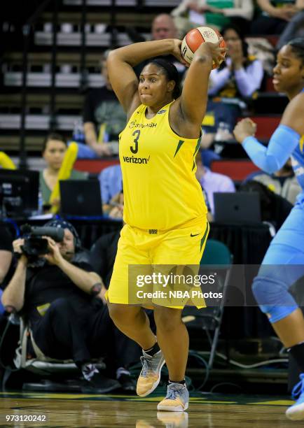 Center Courtney Paris of the Seattle Storm passes the ball during the game against the Chicago Sky on June 12, 2018 at KeyArena in Seattle,...