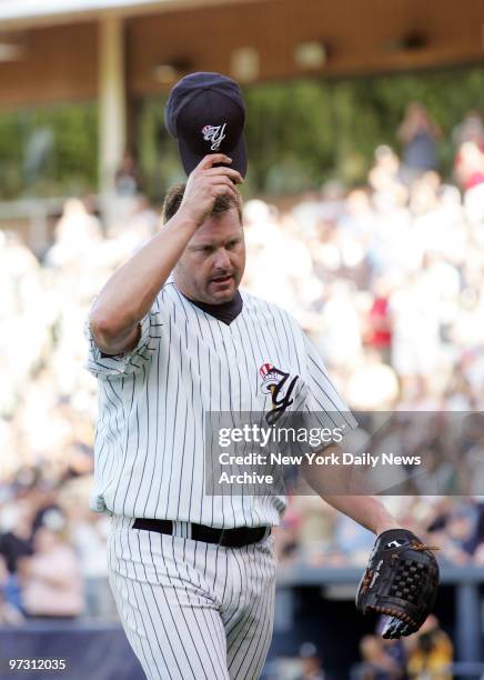 New York Yankees' Roger Clemens tips his cap as he tosses six scoreless innings for the Scranton Wilkes-Barre Yankees against the Toledo Mud Hens at...