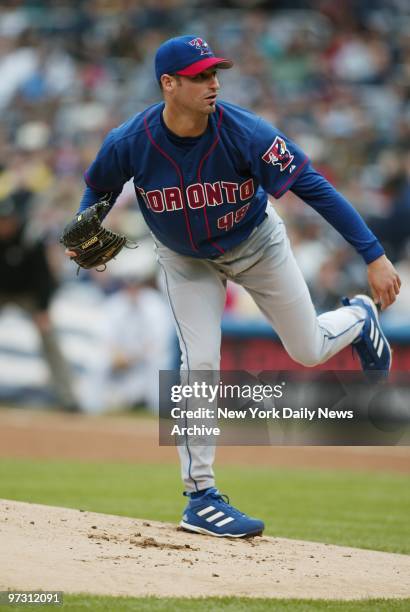 Toronto Blue Jays' starter Doug Davis delivers a pitch during a game against the New York Yankees. Davis got the win as the Toronto beat the Yanks,...