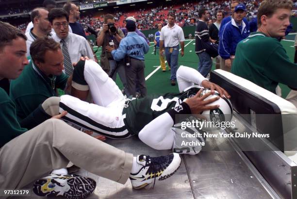 New York Jets' quarterback Ray Lucas carted off field after being injured during the last plays of the game against the Indianapolis Colts.