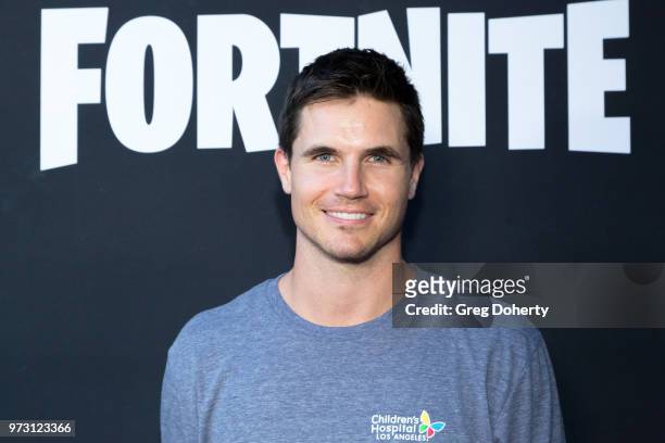 Robbie Amell attends the Epic Games Hosts Fortnite Party Royale on June 12, 2018 in Los Angeles, California.