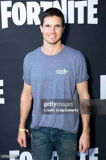 Robbie Amell attends the Epic Games Hosts Fortnite Party Royale on June 12, 2018 in Los Angeles, California.