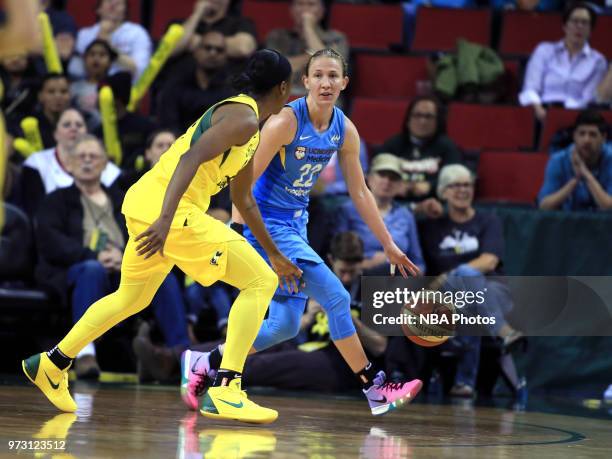 Courtney Vandersloot of the Chicago Sky handles the ball against the Seattle Storm on June 12, 2018 at KeyArena in Seattle, Washington. NOTE TO USER:...