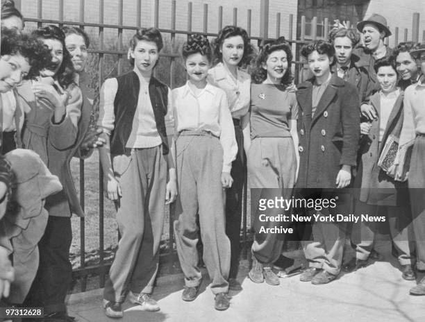 Girls show up in slacks at Abraham Lincoln High School, Brooklyn, in protest because a classmate, Beverly Bernstein, was suspended the day before for...