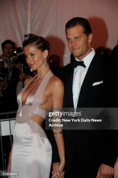 Gisele Bundchen and Tom Brady at the Costume Institute Gala celebrating Superheroes:Fashion and Fantasy and held at the Metropolitan Museum of Art