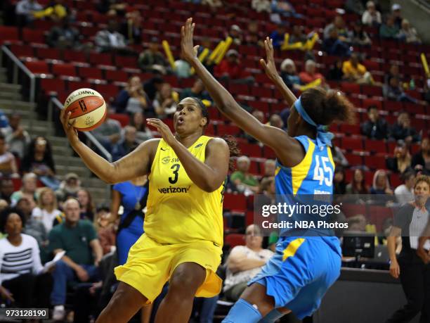 Courtney Paris of the Seattle Storm drives to the basket against the Chicago Sky on June 12, 2018 at KeyArena in Seattle, Washington. NOTE TO USER:...