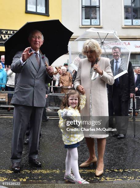 Prince Charles, Prince of Wales and Camilla, Duchess of Cornwall are presented with a bunny rabbit by Matilda Callaghan on the exact spot of the...