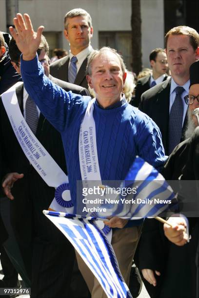 Mayor Michael Bloomberg waves as he walks in the Greek Independence Day Parade along Fifth Ave.