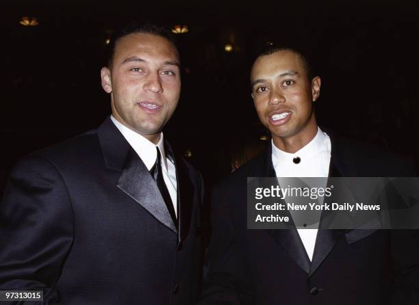 New York Yankees' shortstop Derek Jeter and golfer Tiger Woods get together at Sports Illustrated's Sportsman of the Year awards ceremonies at the...